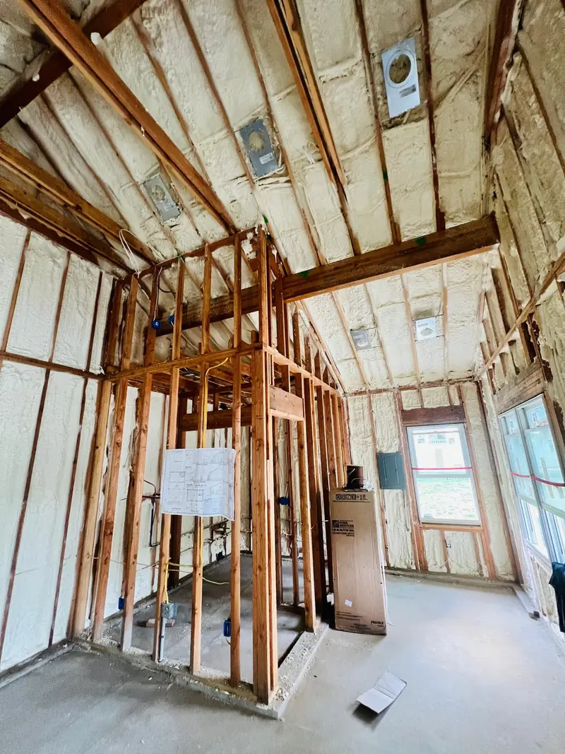 Closed-cell spray foam installed in framed residential walls and roof cavities
